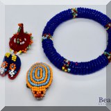 J151. 2 beaded pins of a turtle and a sombrero with shoes and a beaded bracelet. - $24 